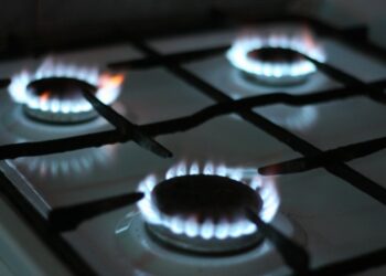 black gas stove with white and black gas stove