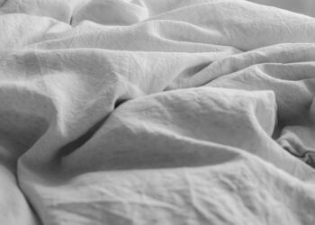 white textile in close up photography