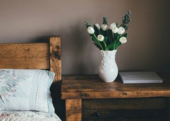 white flower vase on surface